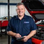 Professional headshot of satisfied customer David Thompson with transmission diagnostic experience