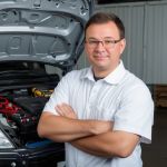 Professional headshot of satisfied customer David Thompson with electrical system diagnostic success