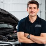 Professional headshot of satisfied customer Michael Johnson with engine diagnostic success